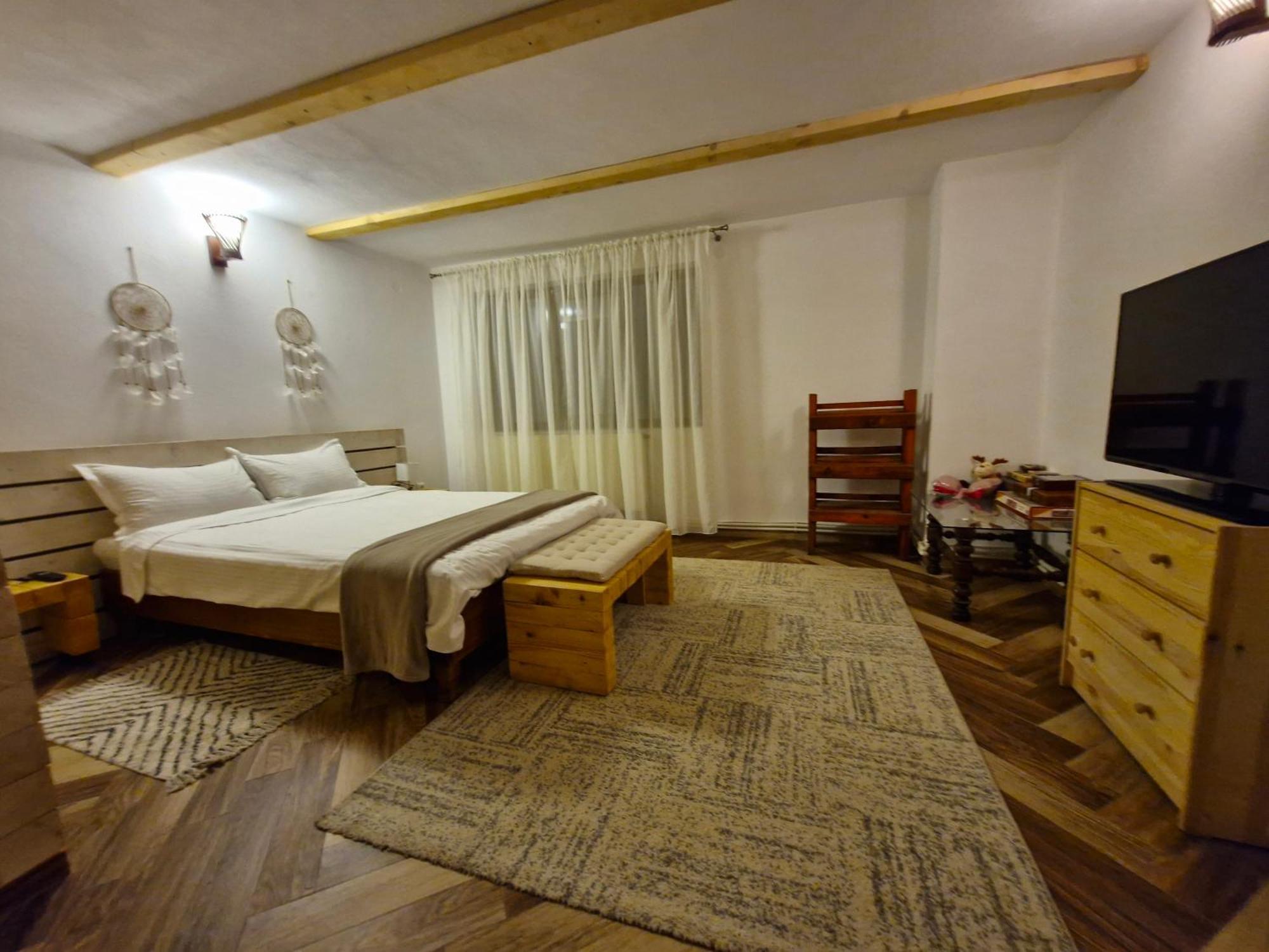 Cabana Din Padurea Valeni วาเลนี เด มุนเต ภายนอก รูปภาพ